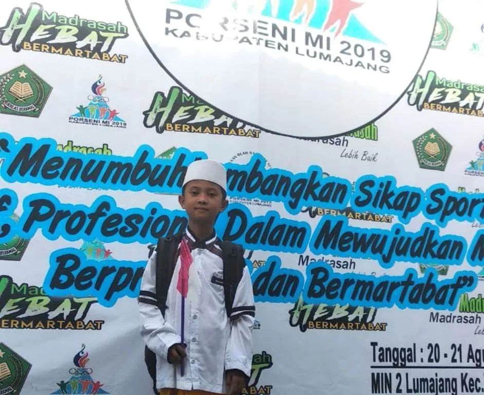 Aditya Siswa MIT Assunniyyah Sumberjati Juara Harapan 2 Tahfidz PORSENI Lumajang